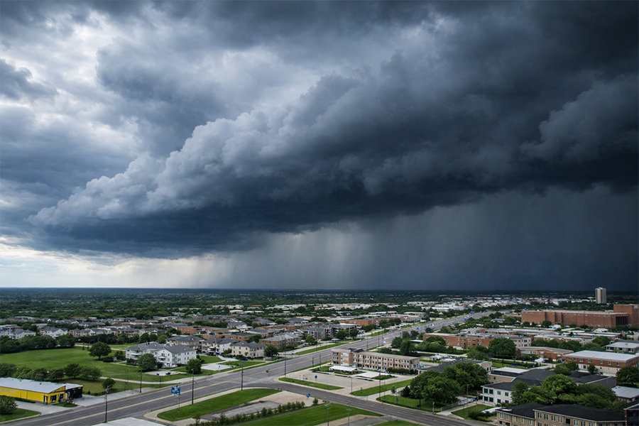 thunder storm clouds over a city